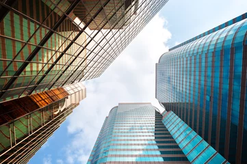 Foto op Plexiglas Hong Kong office buildings with blue sky and clouds © Stripped Pixel