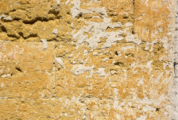 Muro di pietra giallo