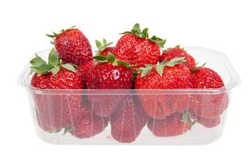 Fresh strawberries in plastic box, isolated on white
