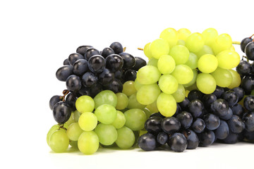 Bunch of white and black grapes.