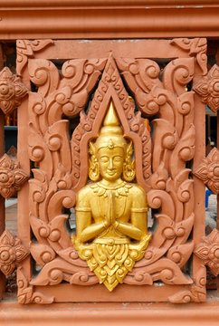Buddha statues in temple wall