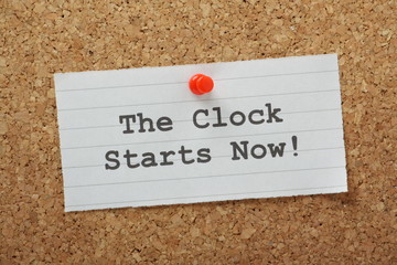 The Clock Starts Now on a cork notice board