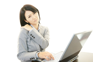 肩痛を訴える女性