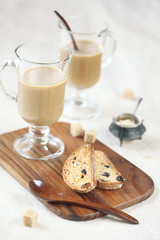 Cardamom Raisin Biscotti with two cups of coffee