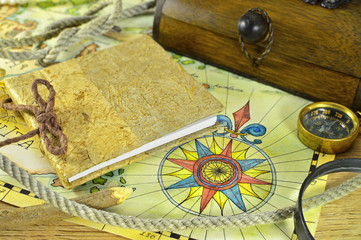 Fototapeta na wymiar Sea map with compass and notepad