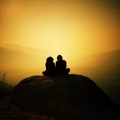 Zelfklevend Fotobehang silhouette of couple © nasruleffendy