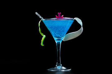 Blue swimming pool Cocktail with caviar and flower petals