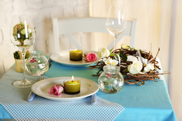 Beautiful holiday Easter table setting in blue tones,