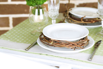 Beautiful holiday Easter table setting in green tones,