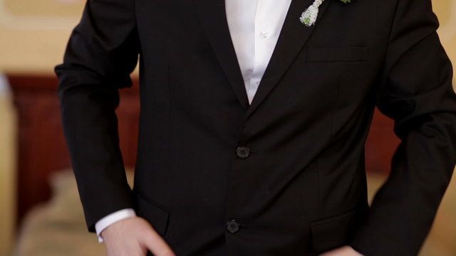 Portrait of young attractive man wearing shirt and black jacket