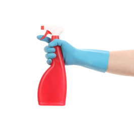 Hand in glove holding red plastic spray bottle.