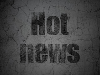 News concept: Hot News on grunge wall background
