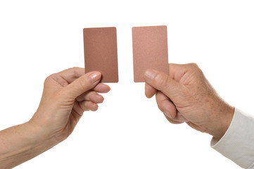 Two hands holding empty blank cards