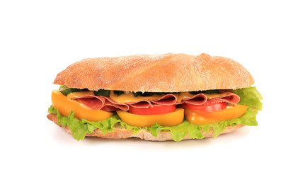 Sandwich with ham, cheese and tomato.