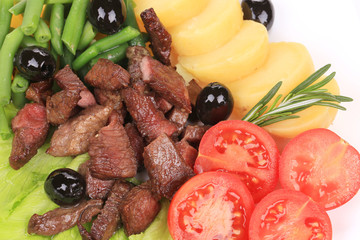 Salad with beef fillet and vegetables.