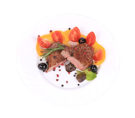 Grilled steak with fresh vegetables.