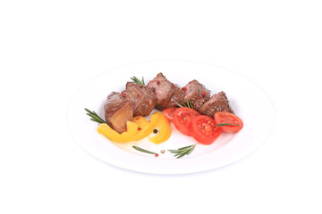Beefsteaks with tomatoes and rosemary.