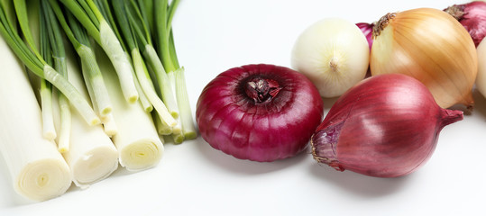 Different raw onion, isolated on white