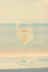 Margarita cocktail on beach with vintage filter effect