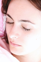 Beautiful young woman sleeping.
