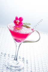 Cocktail with caviar and flower