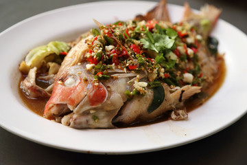 Steamed sea bass with lemon