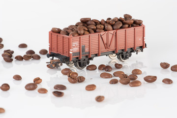 toy rail car with coffee beans three