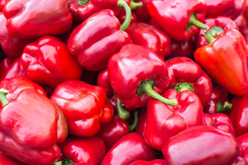 Obraz na płótnie Canvas Shiny sweet peppers in a market stall