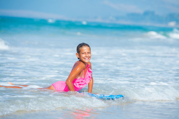 Fototapeta na wymiar Summer vacation - surfer girl.