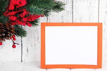 Christmas card on wooden background