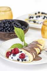 Pancakes with blueberries and raspberries