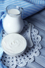 Dairy products on wooden table background