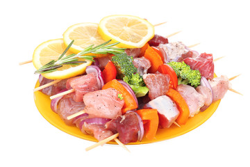 Raw pork kebab isolated on white