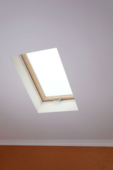 Roof skylight in new modern attic room