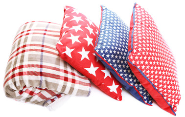 Fototapeta premium Bright pillows and plaid isolated on white