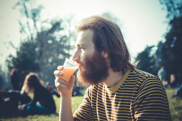 young bearded stylish handsome hipster man