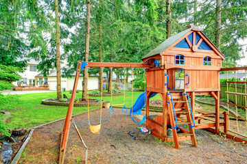 Fototapeta na wymiar Playground for kids. Backyard view