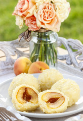 Apricot in pastry, popular austrian dish. Garden party table