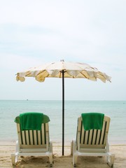 Two liegestuhls on the beach