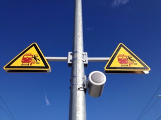danger sign at a railway station