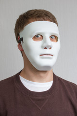 funny and crazy guy with plain white mask