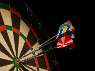 Dartboard with three darts in center target.