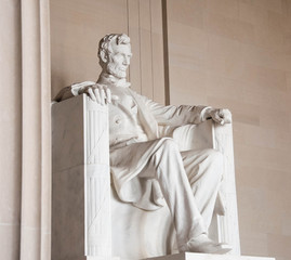 The statue of Abraham Lincoln inside Lincoln Memorial in Washing