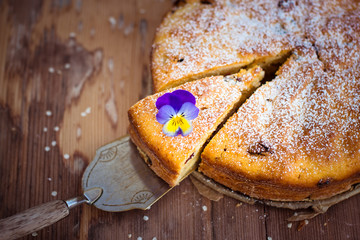 Delicious pie on wooden table. Selective focus