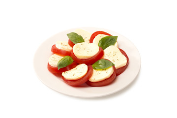 caprese on a white  plate