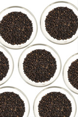 background from black pepper on white background