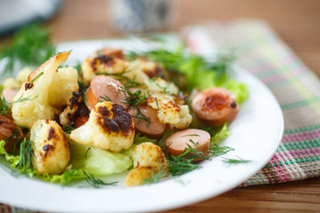 fried cauliflower with sausages