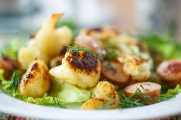 fried cauliflower with sausages