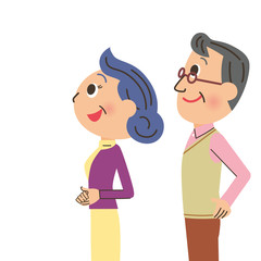 空を見上げる老夫婦