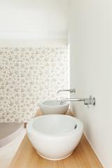 Interior of a new empty house, bathroom, sinks view